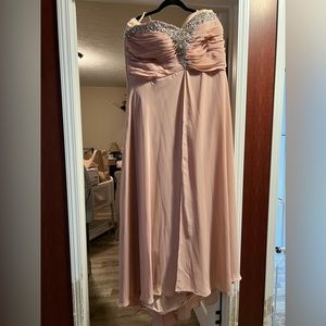 Formal dress with corset back. Size 16. Never been worn.